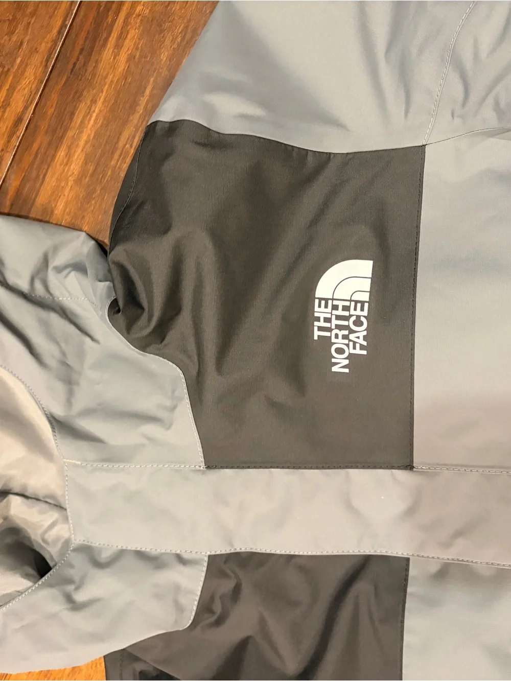 The North Face Gray and Black Kids' Raincoat with Hood